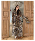 Faux fur coat with fur collar and pockets, shown in street fashion style, length 80cm