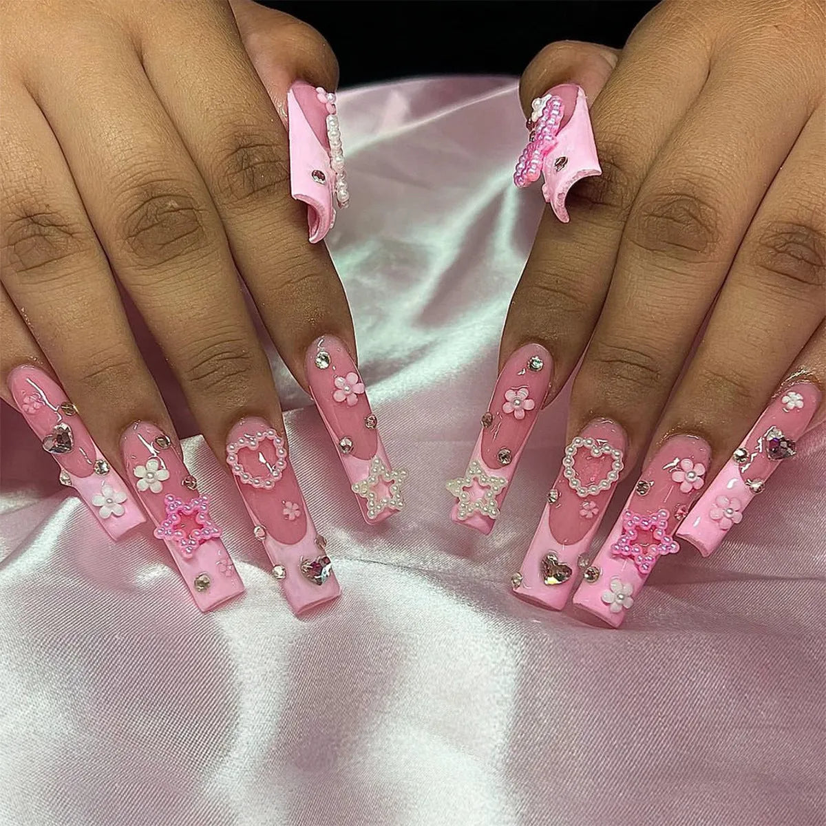 Super long French manicure nails with spot drill detailing and bow accent in XB-70-48 colour