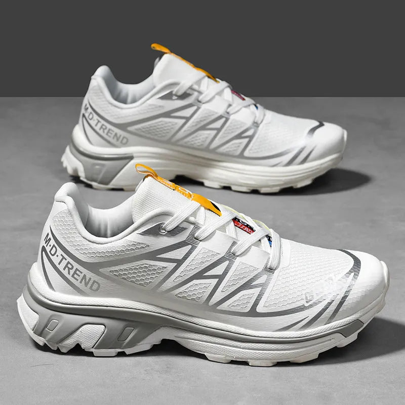 Low-top hiking shoes with mesh lining and rubber soles in khaki colour with front lace-up design