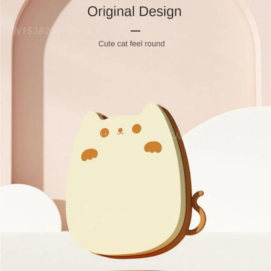 Brown silicone pet comb with dual-texture teeth for grooming cats and dogs.