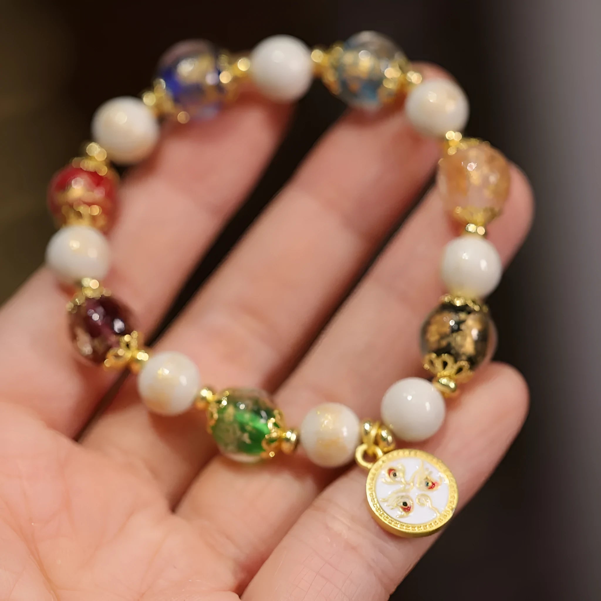 Handmade Five Gods of Wealth glazed bracelet in geometric 10mm design