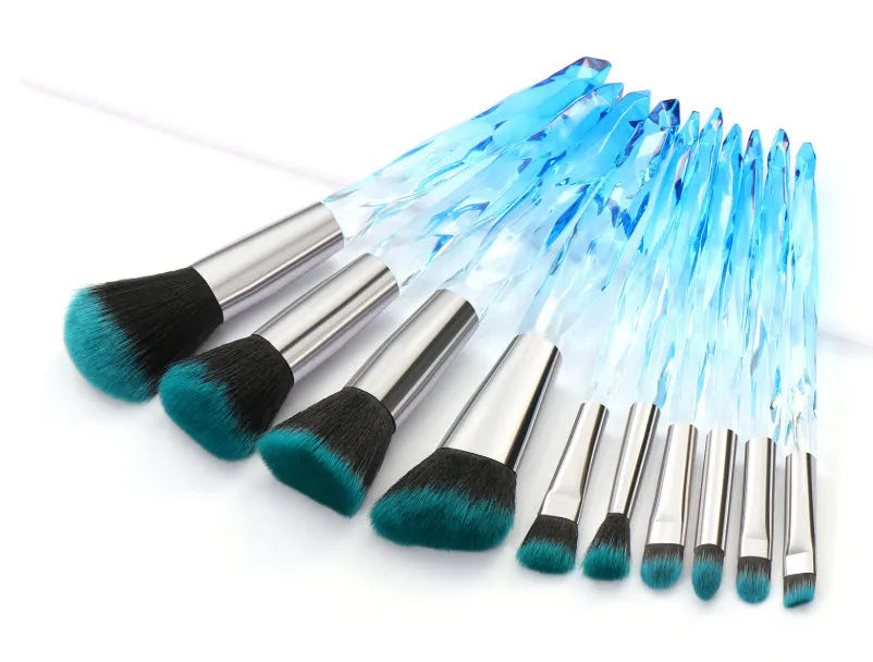 10 clear crystal foundation brushes with diamond shank handles and synthetic bristles arranged in set