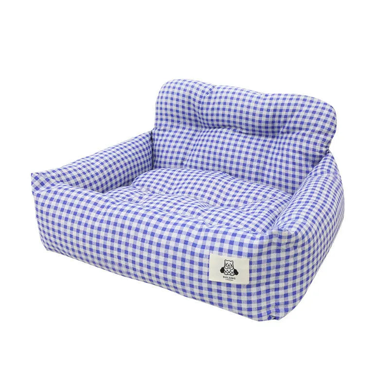 Car-mounted pet outing nest in blue plaid cloth for dog transport during vehicle journeys