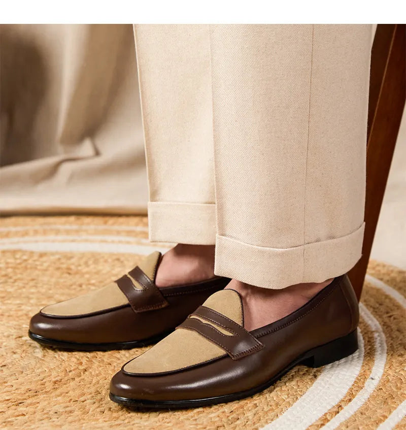 Men's champagne-coloured suede leather loafers with a slip-on design and rubber sole.
