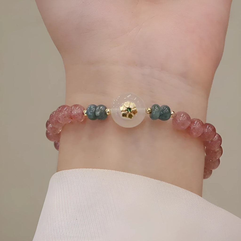 Women's strawberry quartz bracelet with blue water emerald pendant and peace buckle clasp