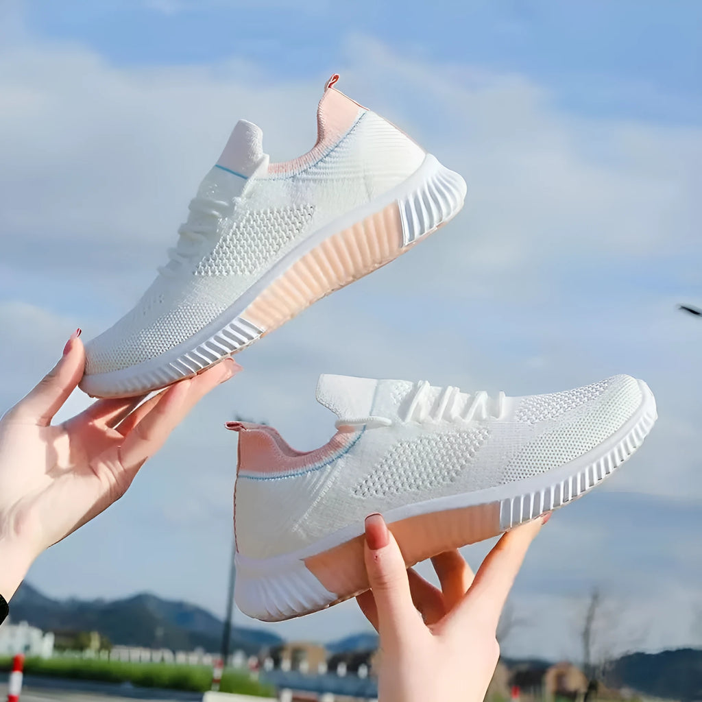 Breathable flyknit low top trainers with mesh upper, cotton lining, PVC sole and front lace-up in pink, blue or black
