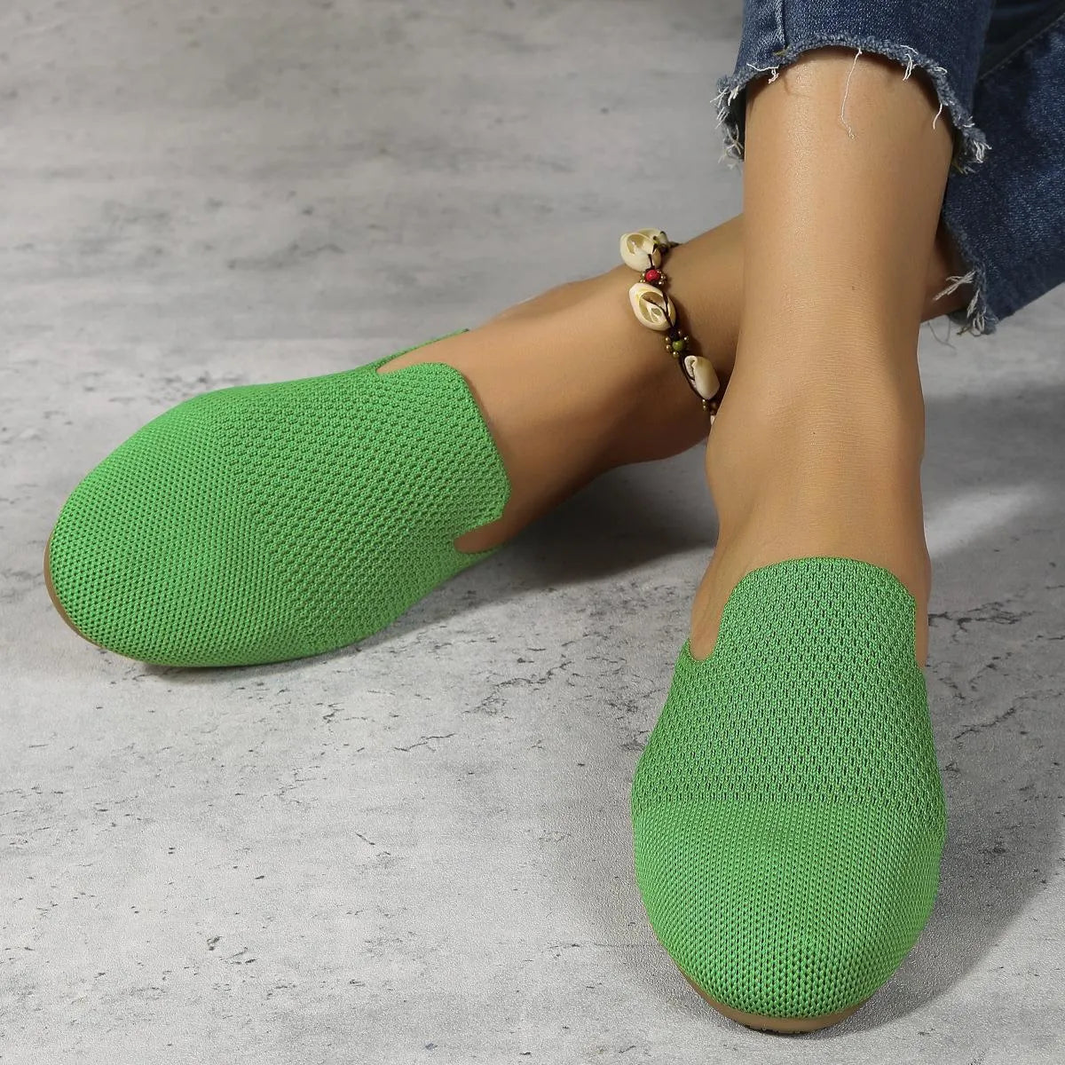Mesh sandals in apricot colour with cloth upper and rubber sole, slip-on design for casual wear.