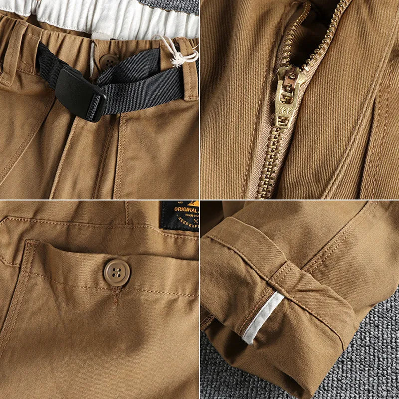 Men's khaki and dark blue cotton work trousers with a 3D cut and zip fly.