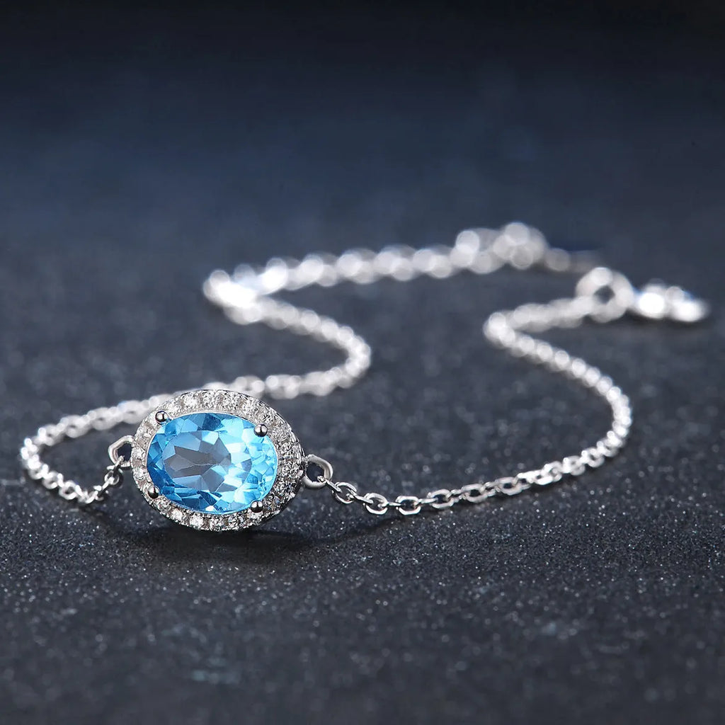925 sterling silver blue topaz jewellery set with geometry design including earrings, ring, pendant, and necklace