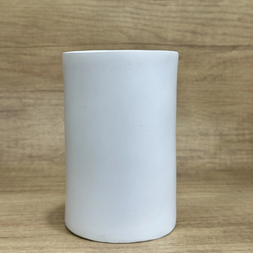 Resin tissue box holder with humorous design, dimensions 8.5cm by 14.6cm, on a desktop