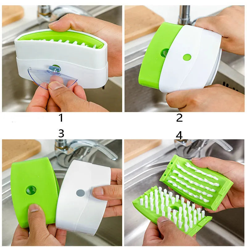 Coloured kitchen brush with knife and fork design and a white suction cup on its handle.