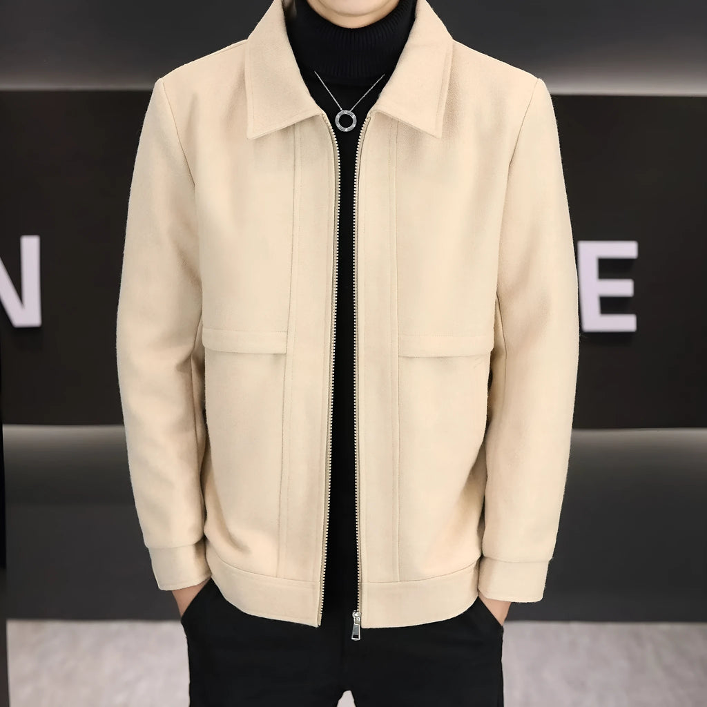 A man's khaki casual jacket with a polo collar and side seam pockets.