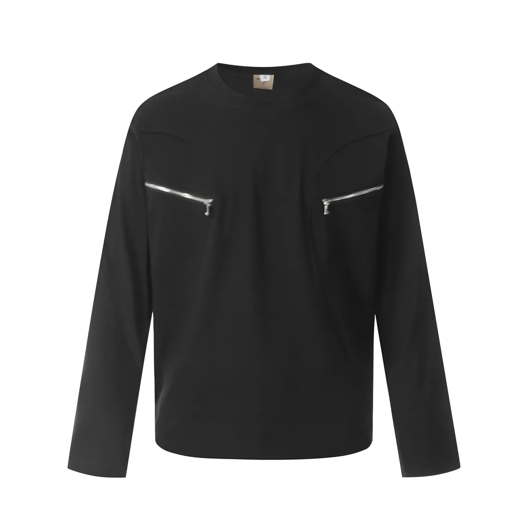 Man wearing a black loose-fit cotton long sleeve casual top.