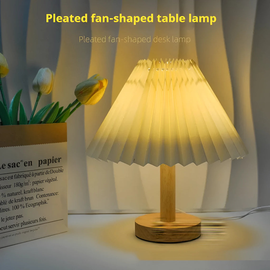 Vintage pleated umbrella-shaped bedside lamp with remote control on bedside table