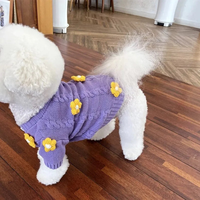 Purple knitted dog clothing with floral pattern showing size options for small pets