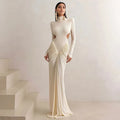 Long sleeve high collar slim fit pleated backless dress in light apricot colour, showcasing private clothing socialite style