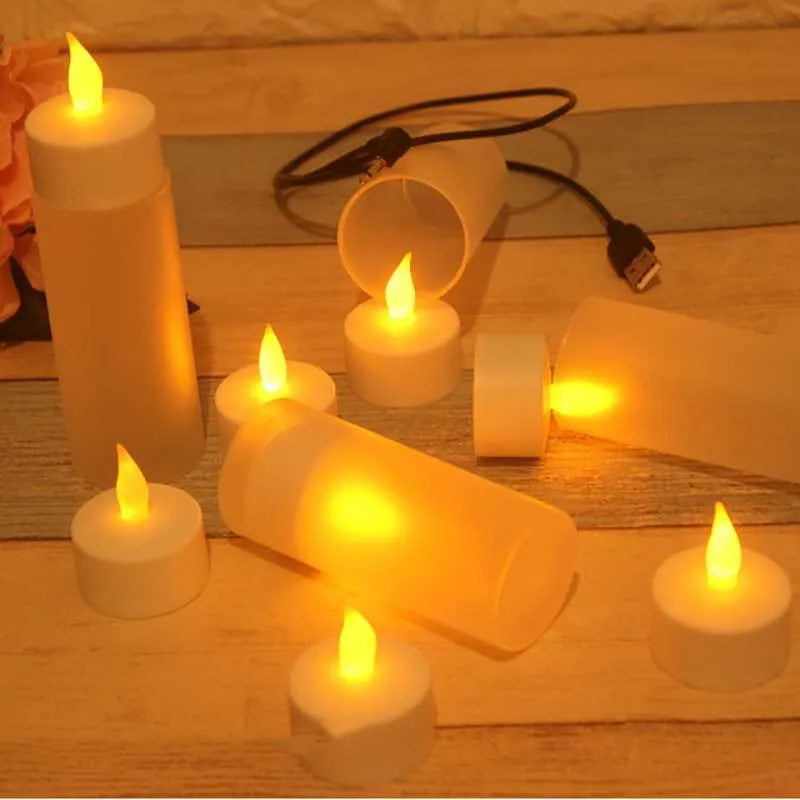 White plastic USB rechargeable LED candle lamp with flame-shaped head next to plastic cup and USB cable.