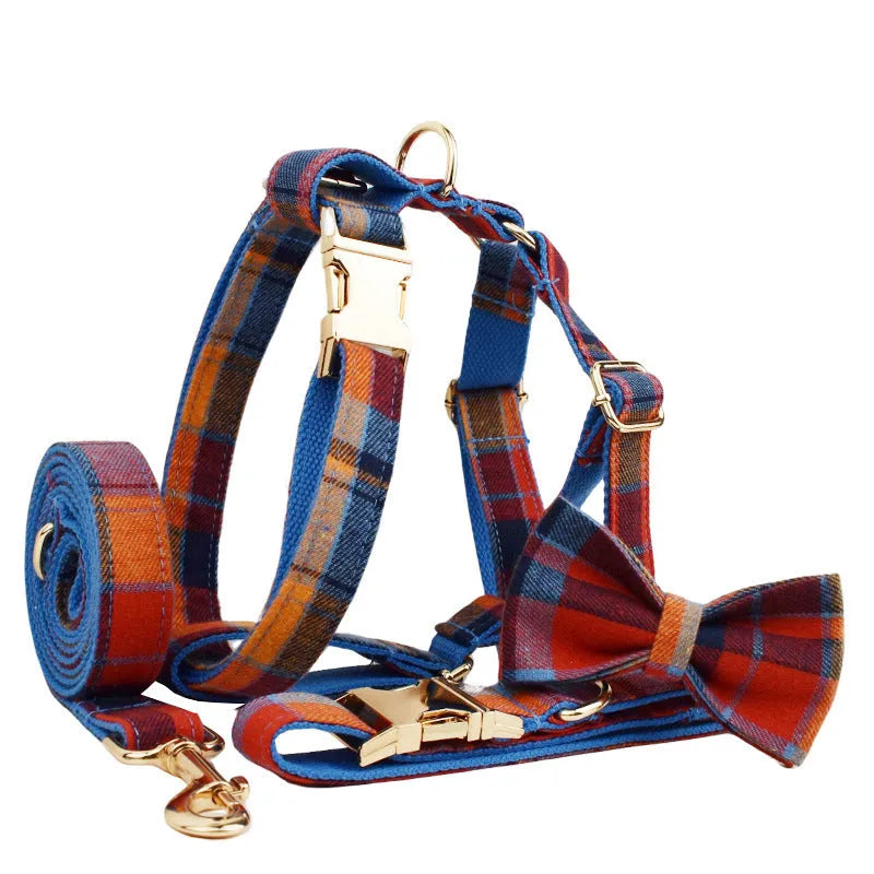 Dog accessory four-piece set showing collar, leash, vest, and bow tie in cloth fabric