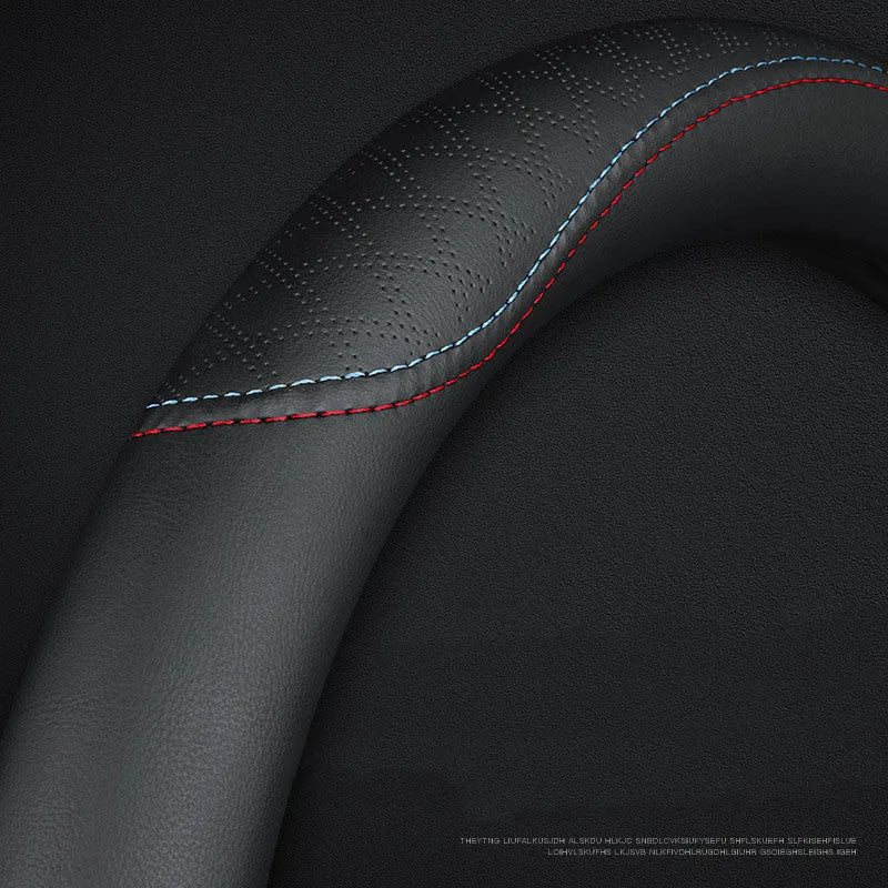 Black leather steering wheel cover with two-color stitching on Suzuki steering wheel, showing 38cm diameter and ultra-thin design