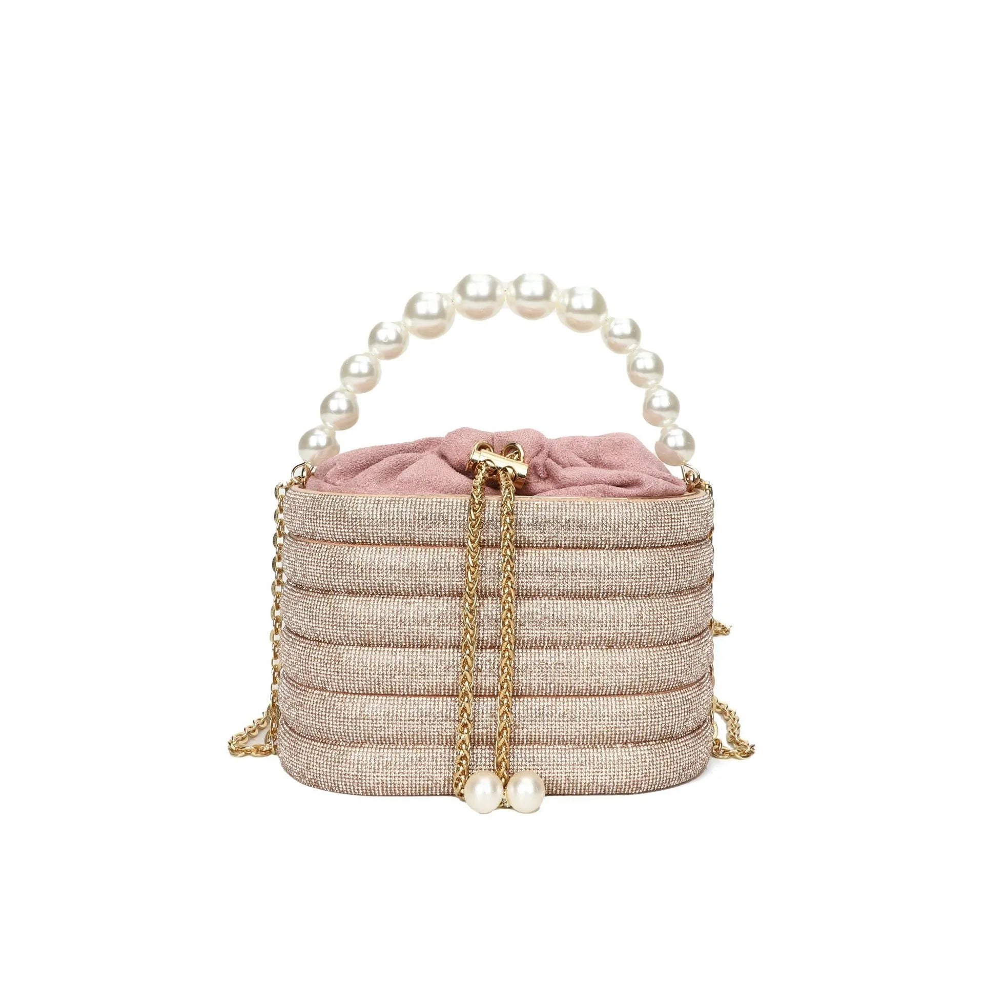 Women's round crossbody bag in soft PU with beaded details, adjustable strap, and zippered interior organiser.
