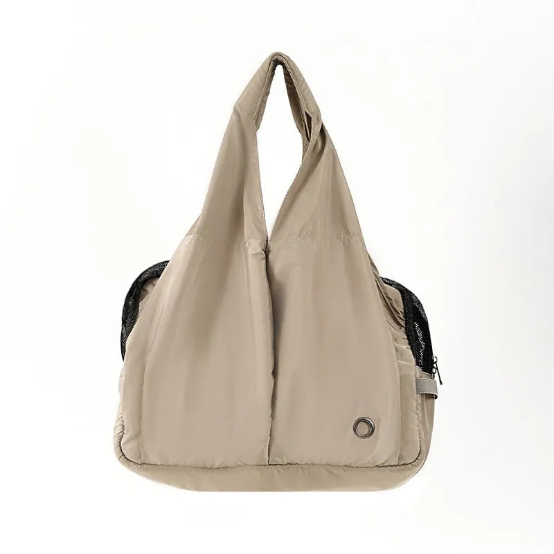 Apricot cloth pet handbag with dimensions 41x16x28cm showing adjustable straps and breathable fabric construction