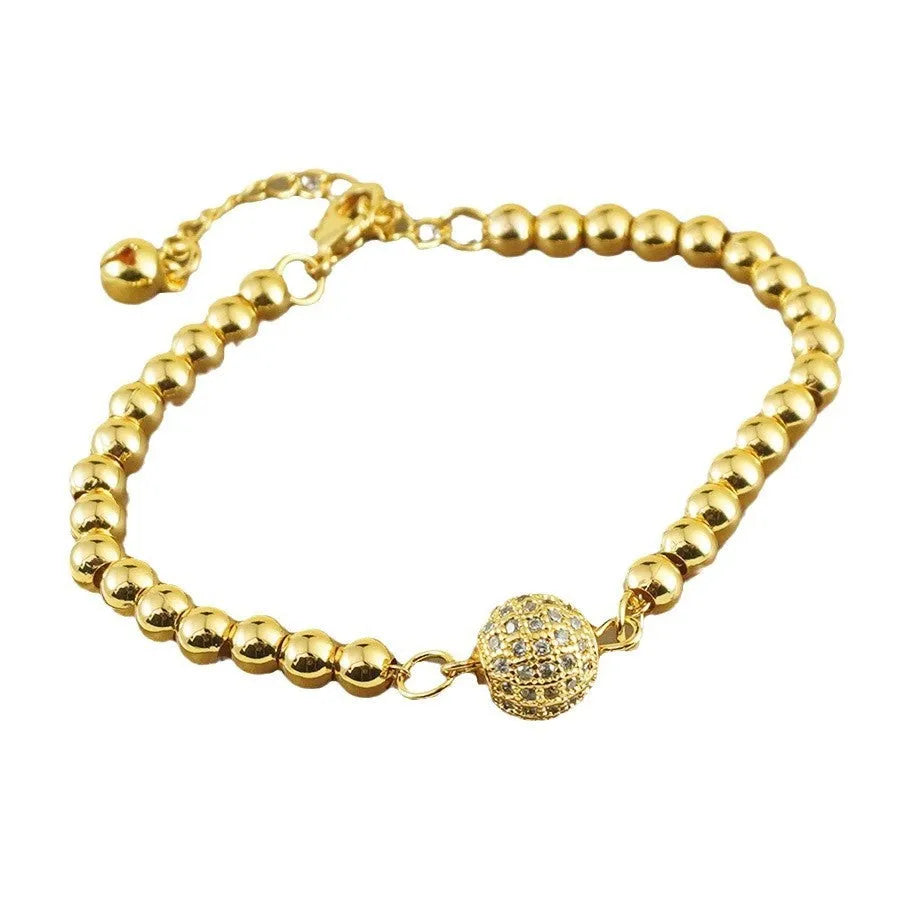 Women's copper bracelet with heart shape and round zircon stones in Arabic design style