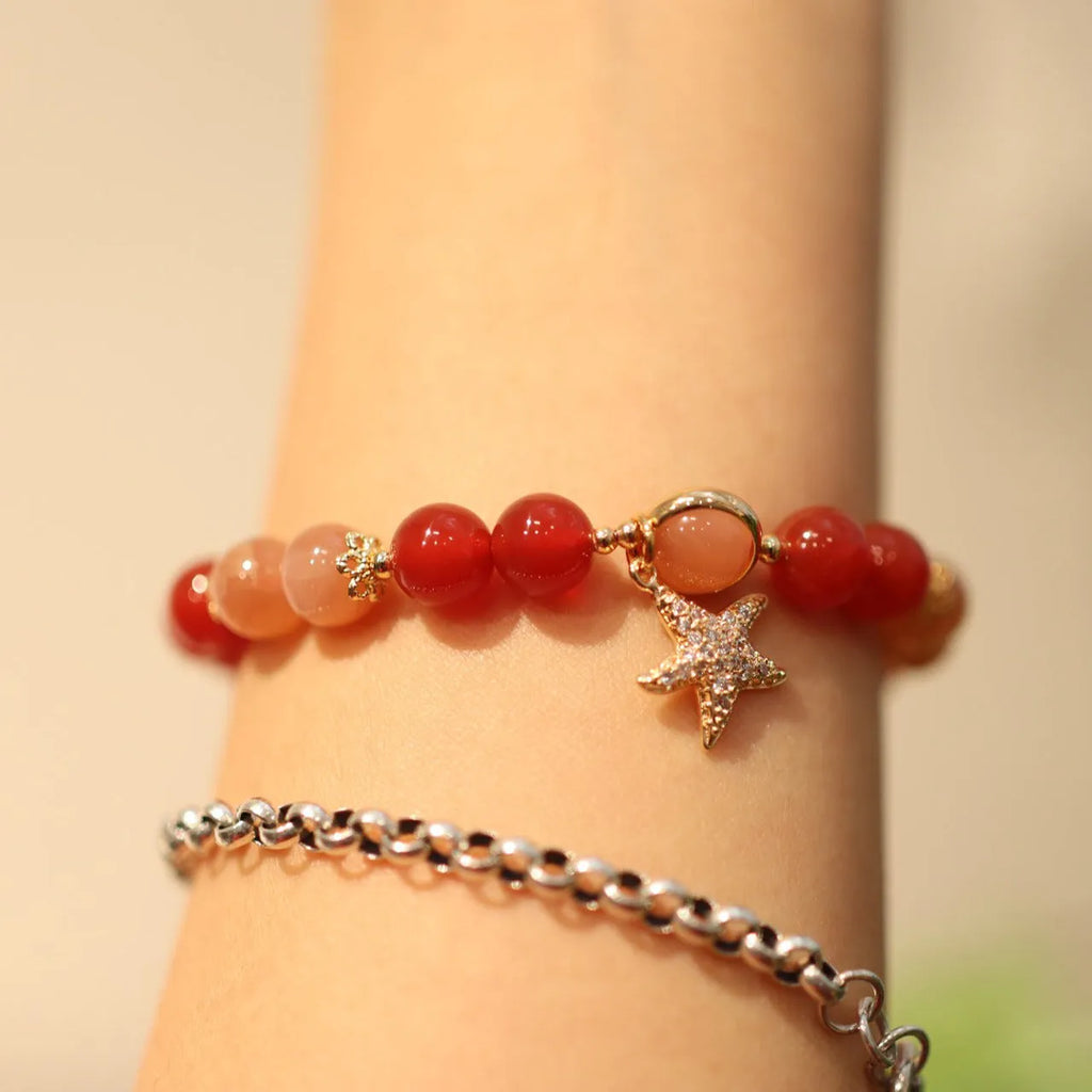 Handmade women's 8mm red agate and sunstone bracelet with xiangyun patterns in ethnic style