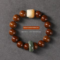 Hand-woven ivory nut lion round bead artistic bracelet with 13mm spherical beads