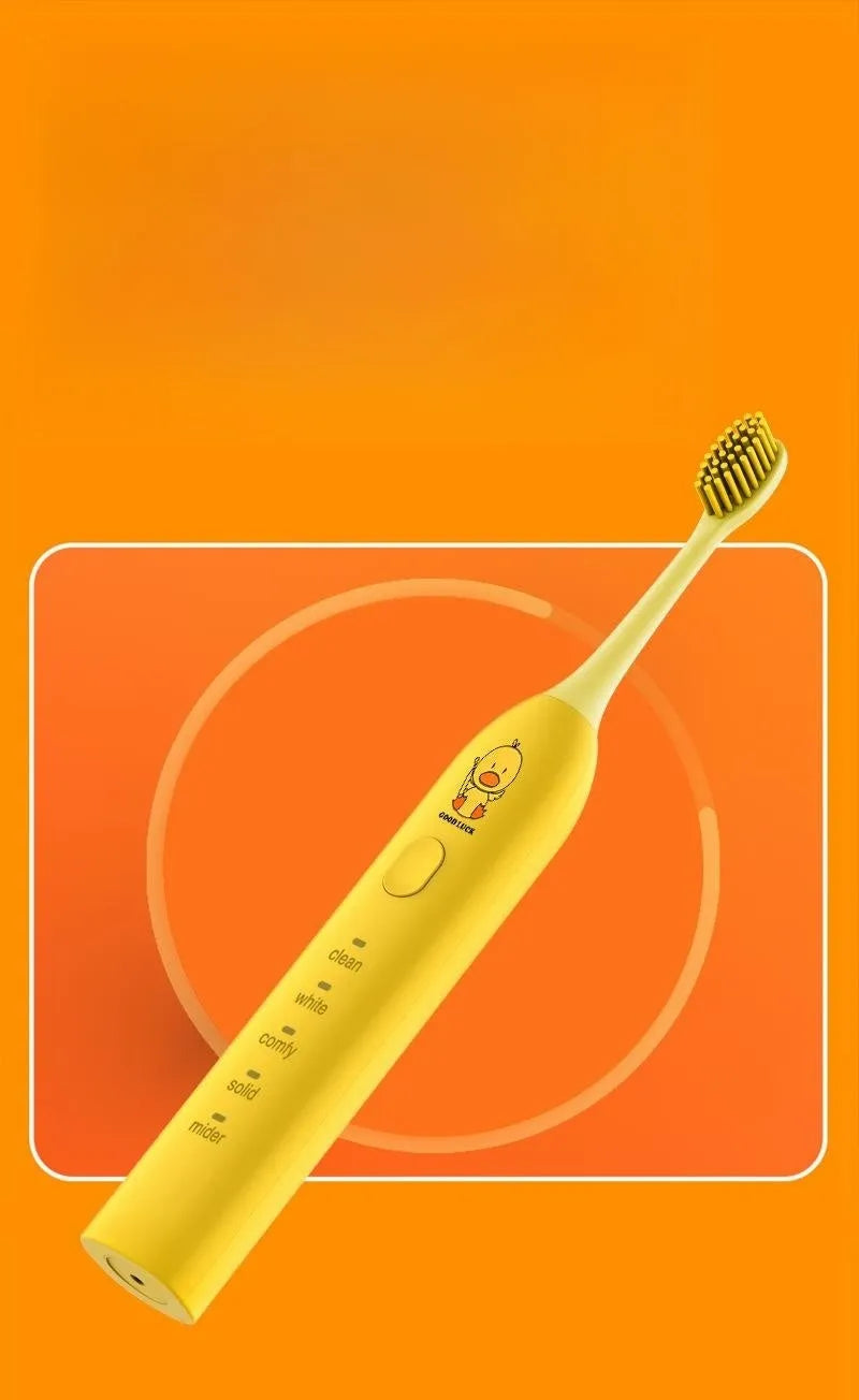Yellow duck designed rechargeable electric toothbrush with USB port and soft bristle head.