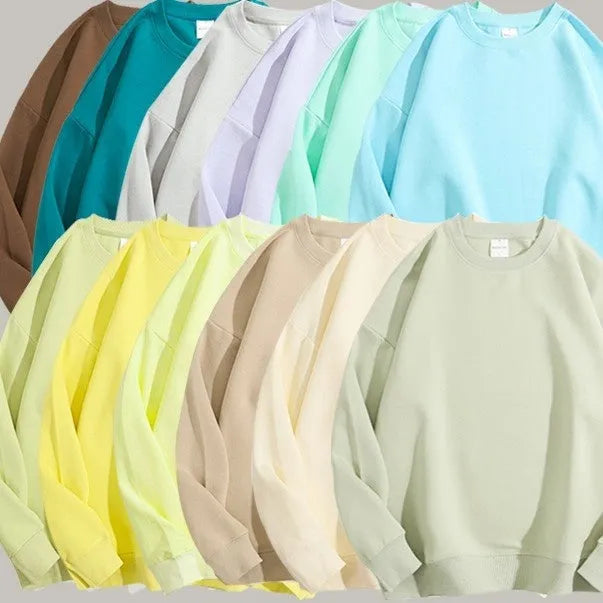 Cotton off-shoulder sweater in loose fit with round neck and long sleeves, available in multiple colours