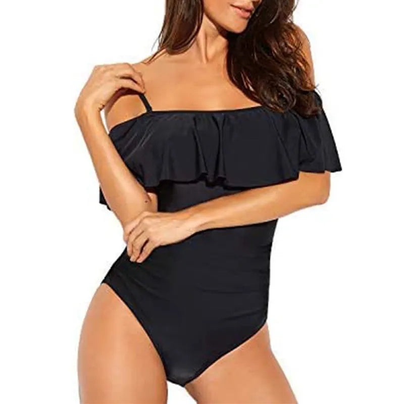 Black one-piece swimsuit with cut-out design and ruffled straps for swimming activities