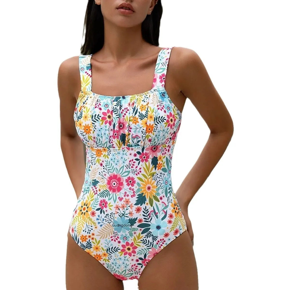 Women's floral print one-piece swimsuit with full-bed lining on a mannequin