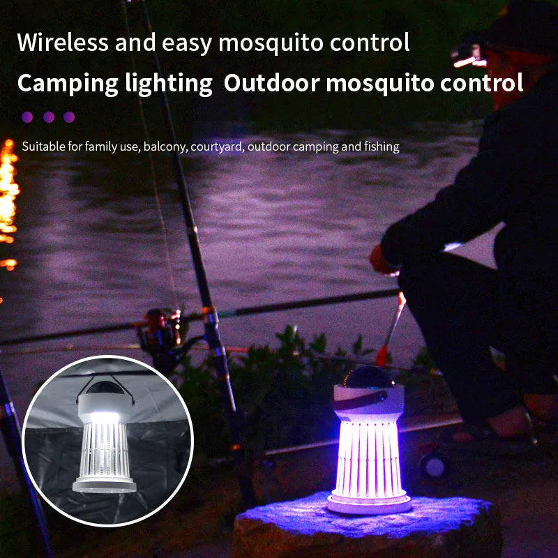 White electric mosquito killer lamp with star projection feature and a folding handle on a table.