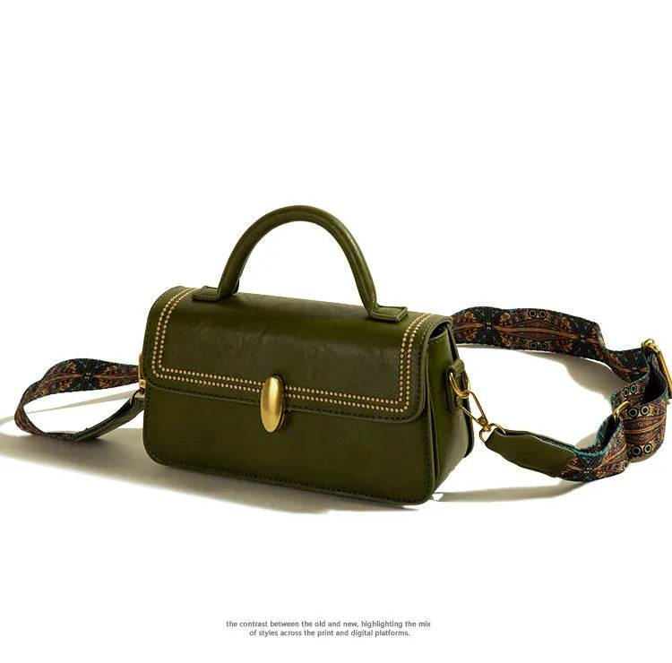 Brown retro messenger bag with square vertical shape, sandwich pocket, and internal phone compartment, measuring 23cm by 8cm by 12.5cm