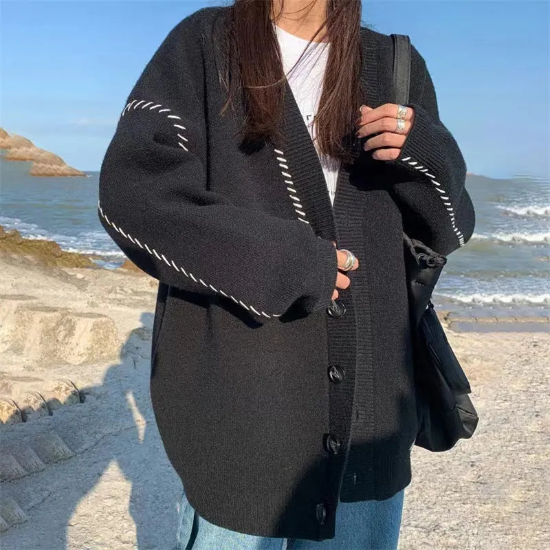 Women's loose fit knitted cardigan top coat in black solid colour with long sleeves
