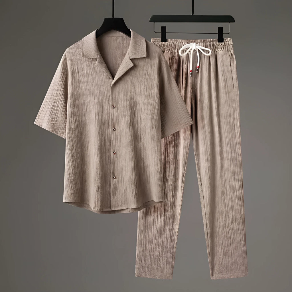Men's Chinese style two-piece sports set with short sleeve shirt and trousers in polyester fabric