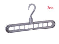 Plastic storage hanger with rotating handle in pink or green, 33 cm long, for heavy clothing