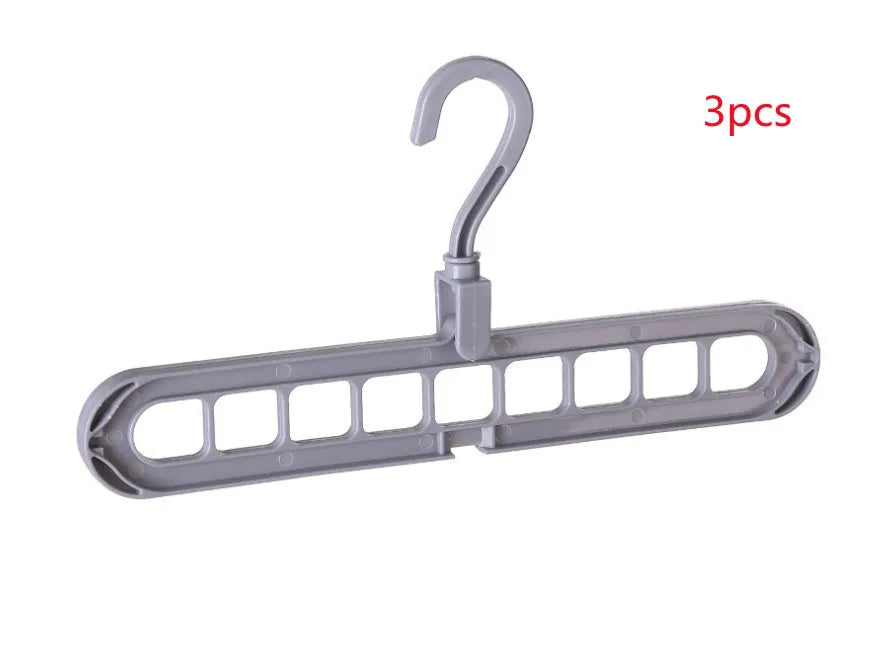 Plastic storage hanger with rotating handle in pink or green, 33 cm long, for heavy clothing