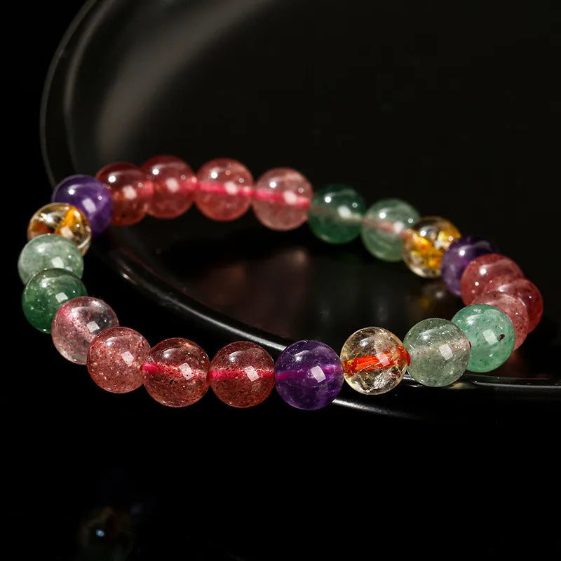 Women's strawberry quartz bracelet with round beads in a natural tourmaline colour
