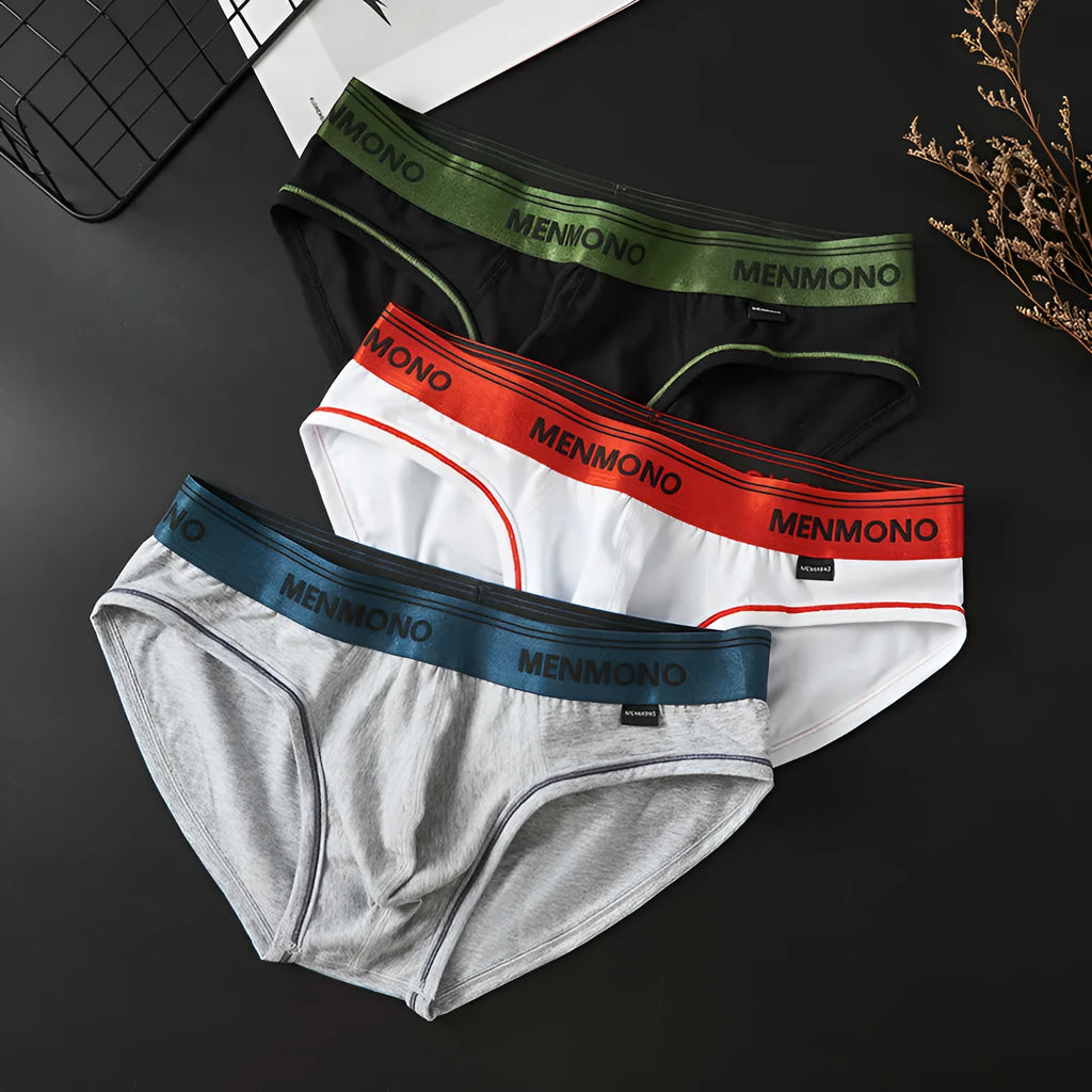 Men's low-waist cotton briefs in solid colours with a briefs style, showing breathable fabric and low-waist design.