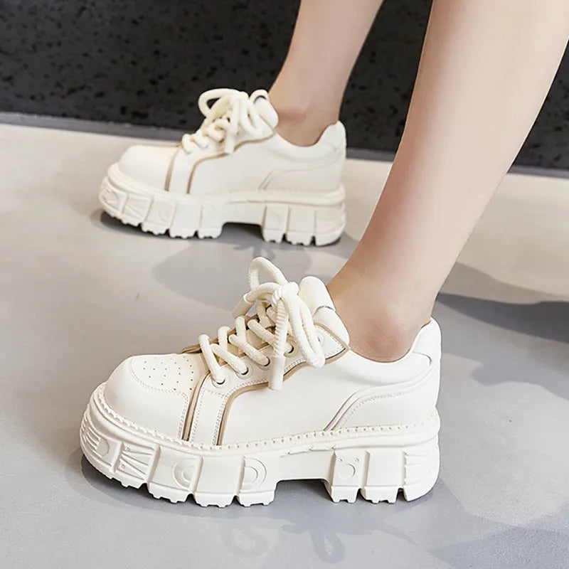 Beige muffin bottom leather shoes with 3cm rubber foam sole on a neutral background