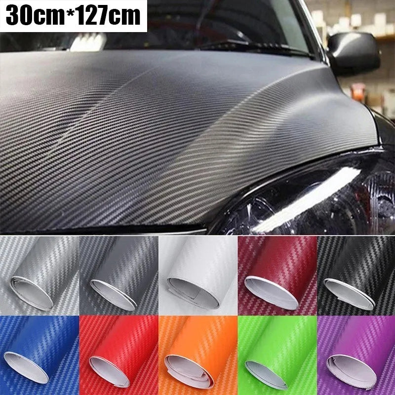 Roll of black carbon fibre textured vinyl sticker for car decoration, showing 3D pattern.