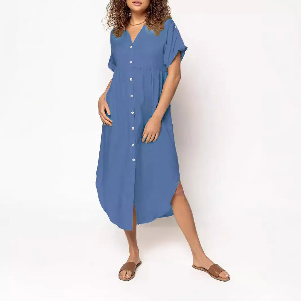 Loose-fit mid-length dress with button front in polyester fabric, available in multiple colours and sizes.