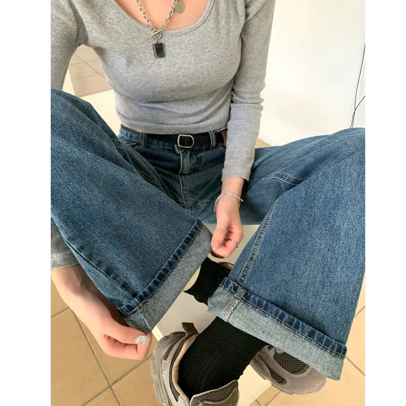 Women's retro blue straight-leg jeans with high-waist design on mannequin showing front and side views