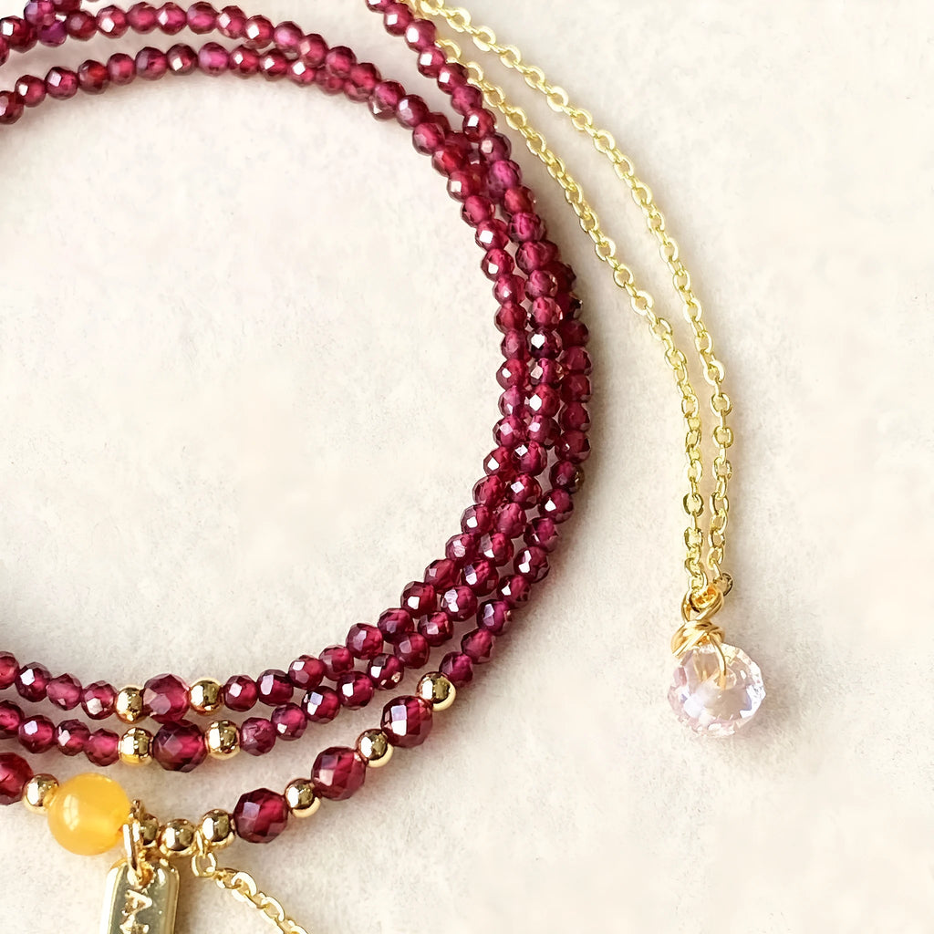 Wine red garnet bracelet with beeswax cut beads that can also be worn as a necklace.