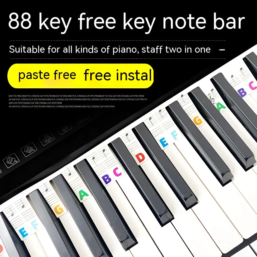 Set of 88 white cardboard piano key stickers showing staff notation and colour note bars for a full-size keyboard.