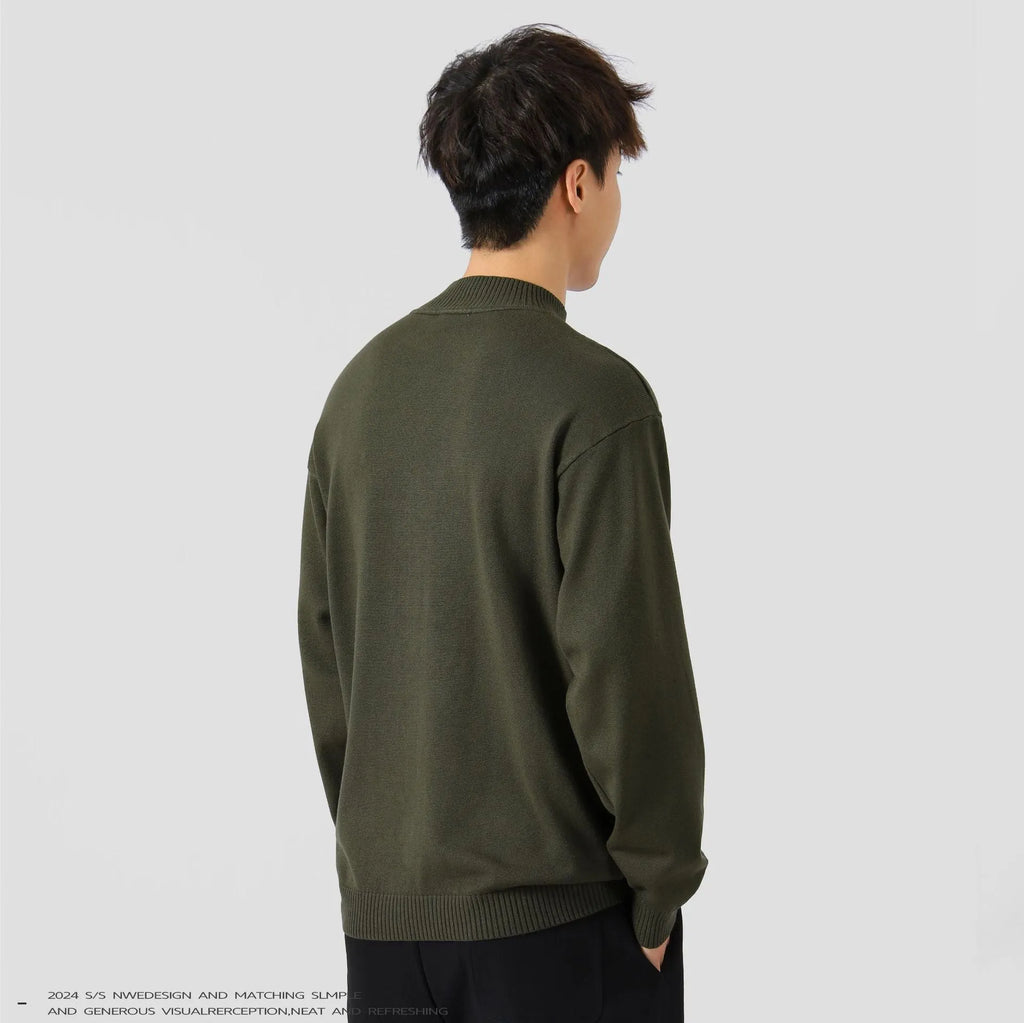 Men's solid colour loose long-sleeved pullover sweater on a hanger, shown in army green.