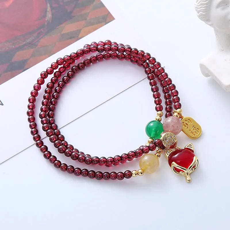 Purplish red garnet fox charm adjustable bracelet for women on rope cord
