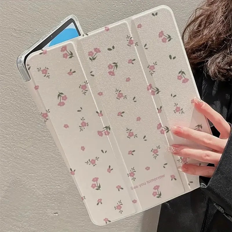Transparent floral tri-fold protective case for Apple iPad showing magnetic bracket function
