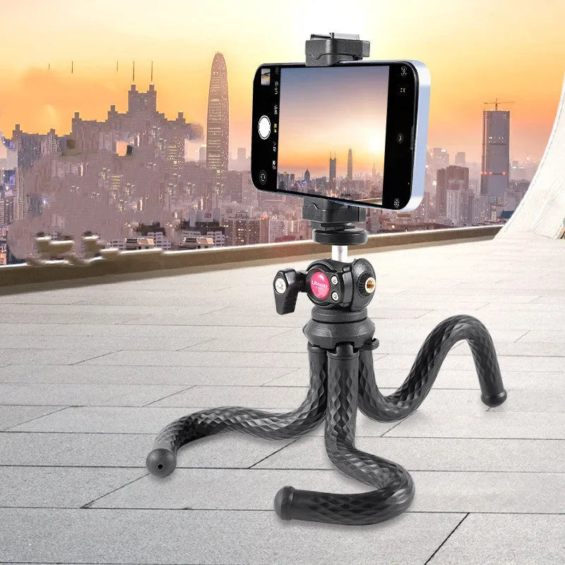 Black octopus-style mobile phone tripod extended to 360mm with smartphone attached via included clip
